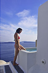 Dip into the Jacuzzi Pool on the edge of the Caldera at Residence Suites