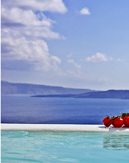 Relax in the Jacuzzi Pool at the edge of the Caldera, glass of wine in hand, and just gaze ... this is Residence Suites in Santorini